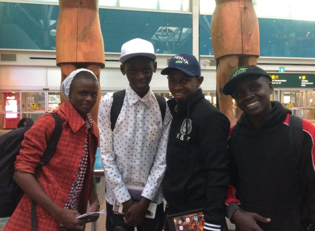 The four boys together at Vancouver international Airport. From left: Moses, Denis, Allan, Stephen